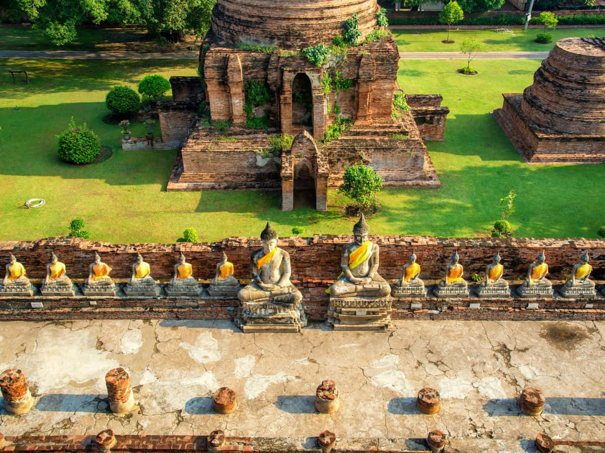 Ayutthaya Buddha Statues Row Ancient Temple Wallpaper