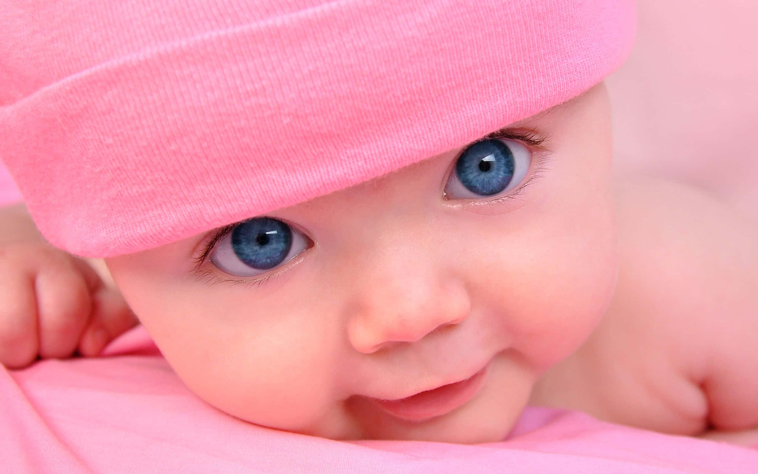 Adorable Baby Smiling With Closed Eyes
