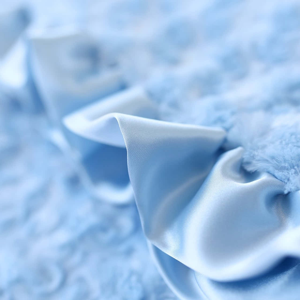 Babyblå lyseblå æstetisk satinribbon rynker Wallpaper