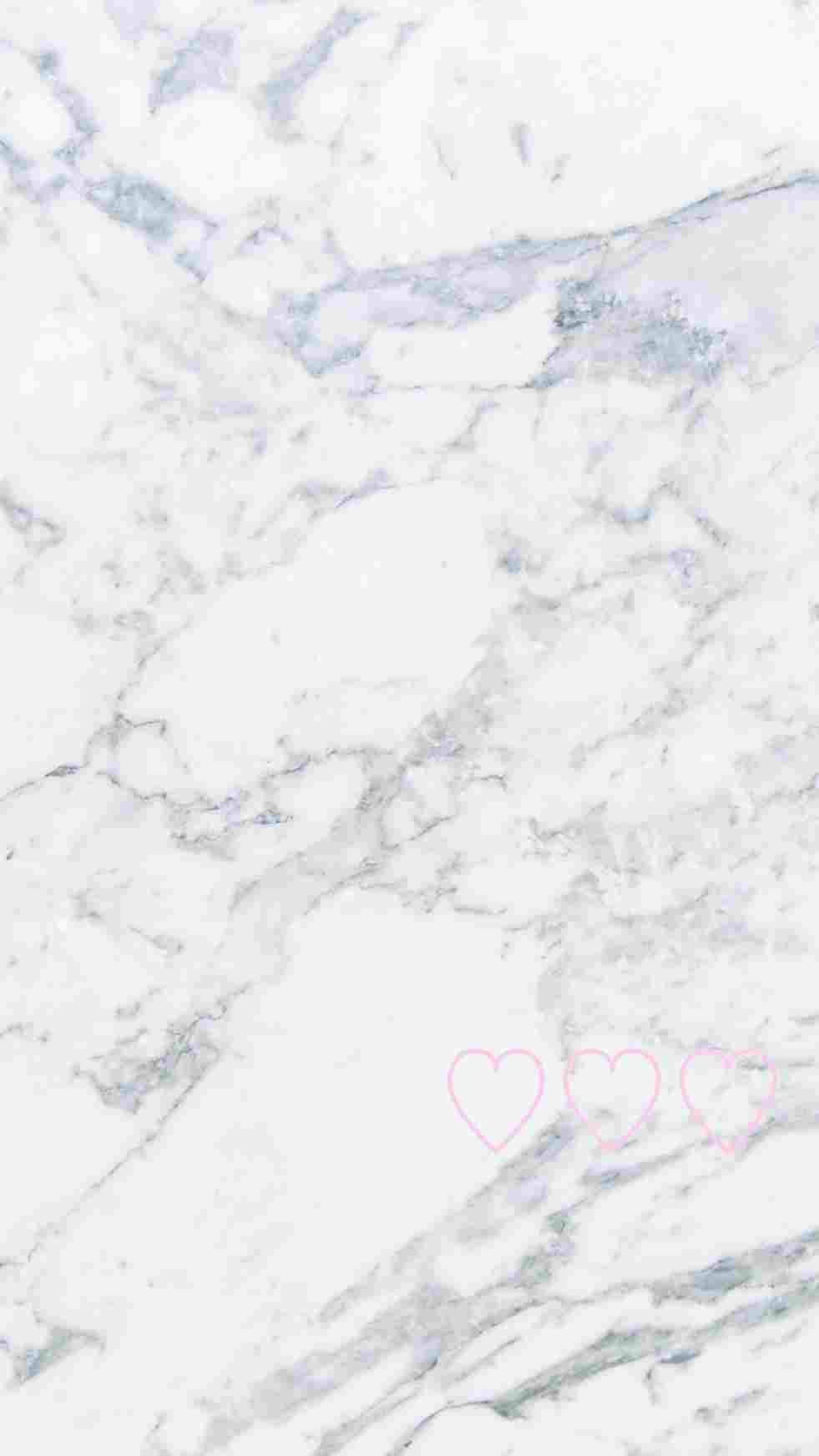 A White Marble Background With Pink Hearts On It Wallpaper