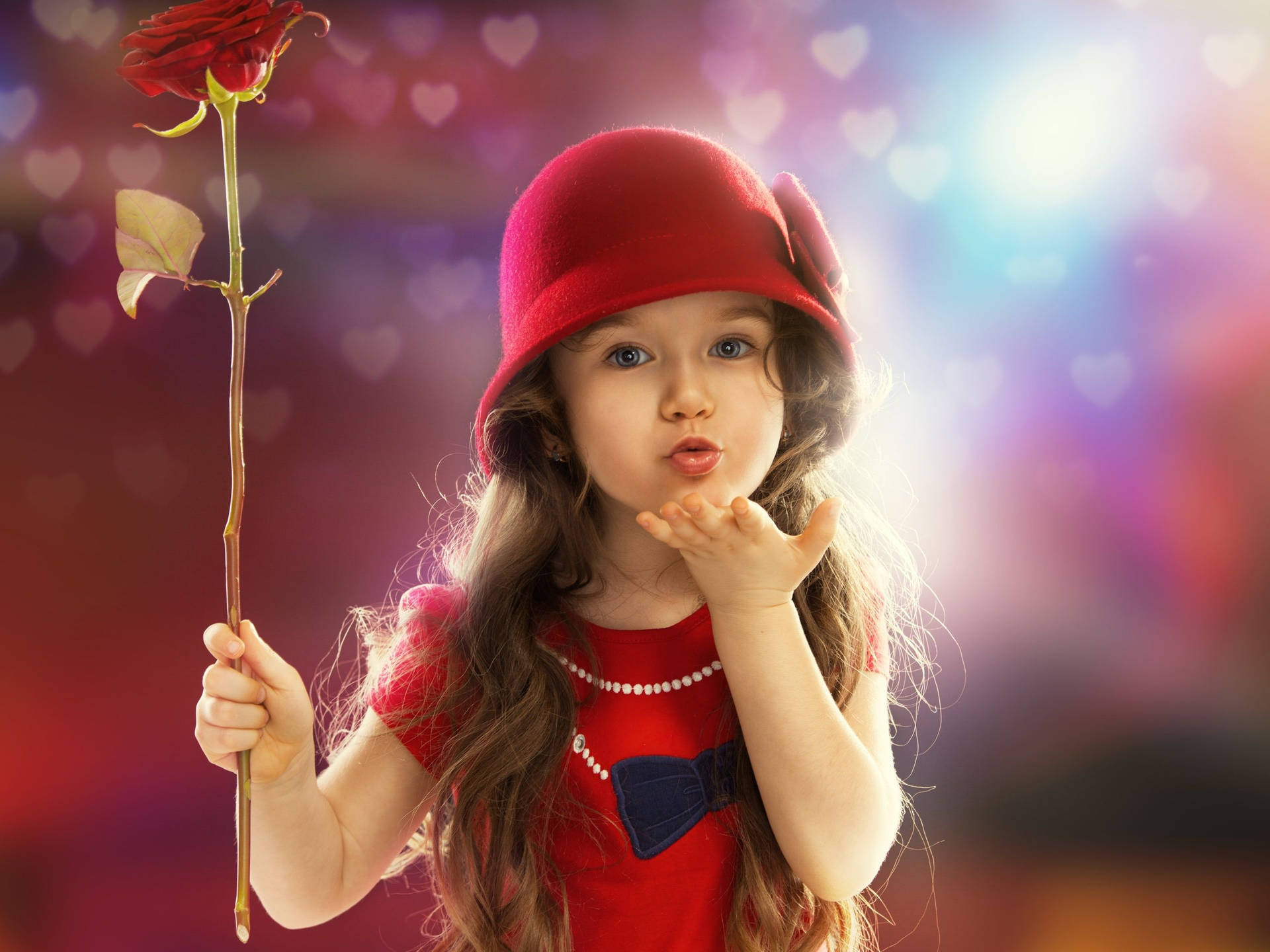 Baby Girl Holding A Rose Wallpaper