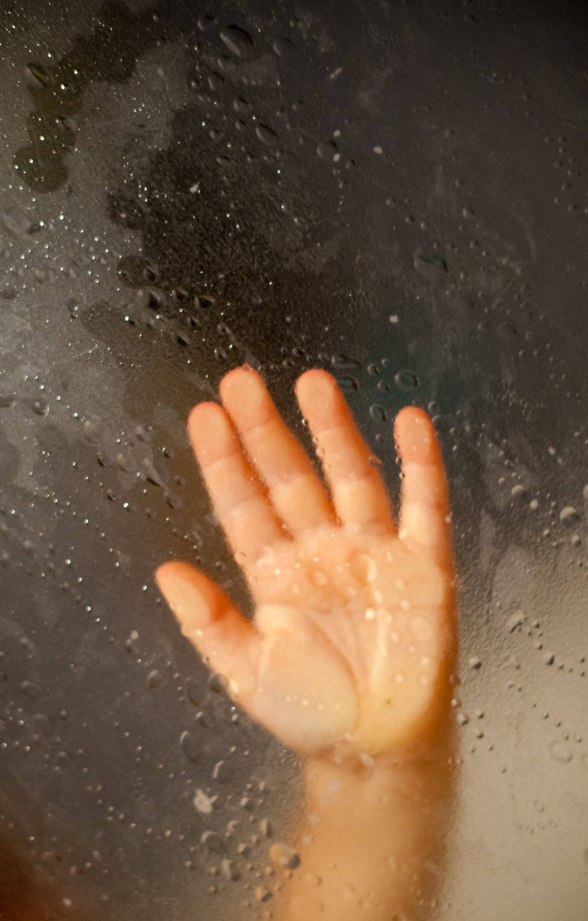Baby Hand On A Wet Glass Wallpaper