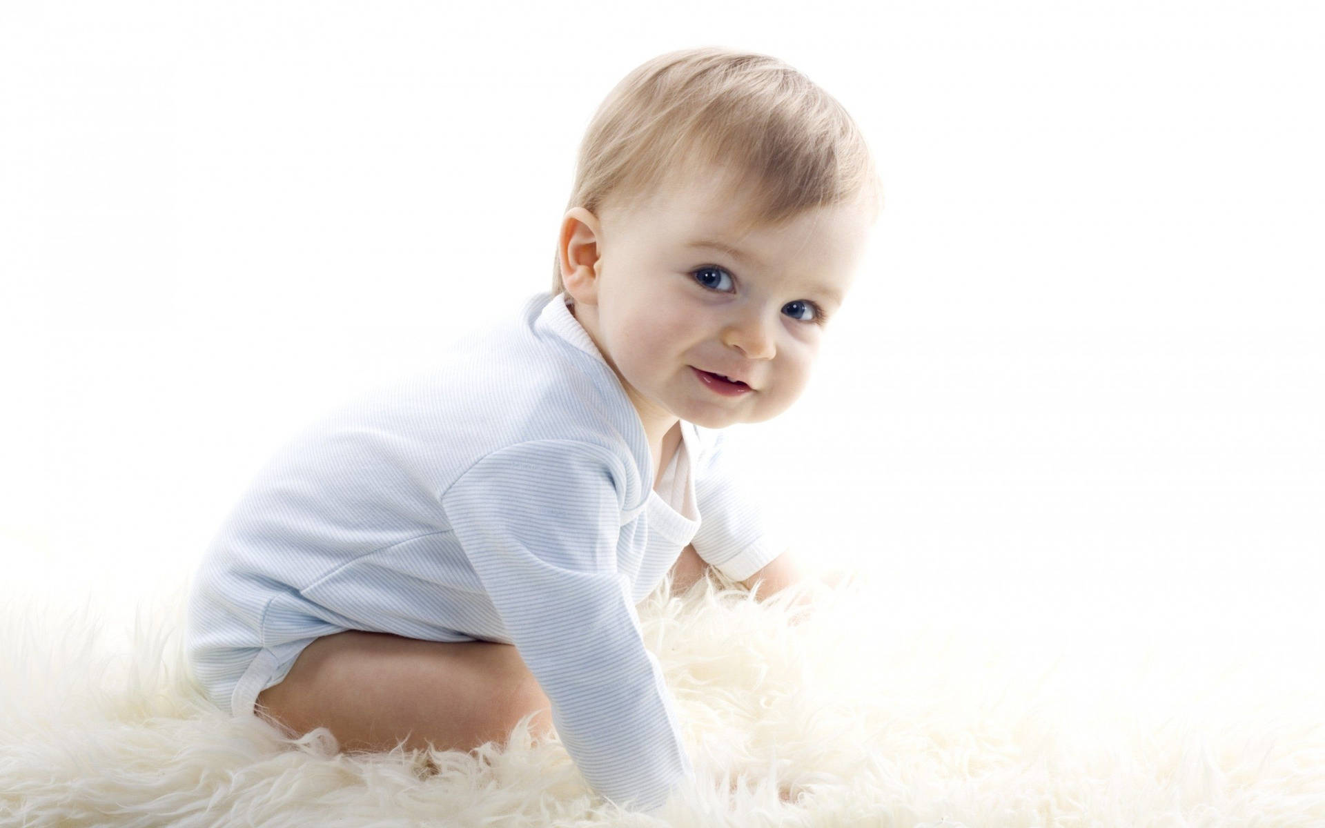 Baby In White Fur Wallpaper