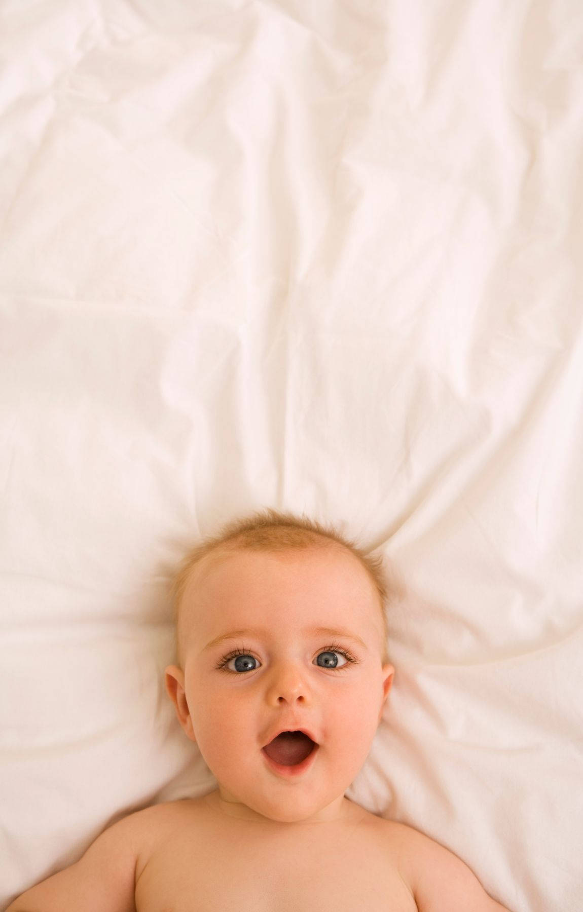 Babyfotografiemit Überraschtem Ausdruck Wallpaper