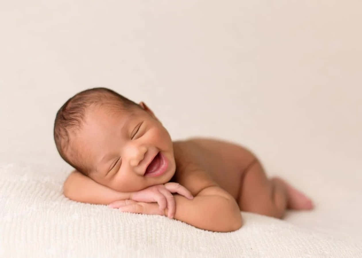 Carinaimmagine Del Sorriso Di Un Bebè Piccolo