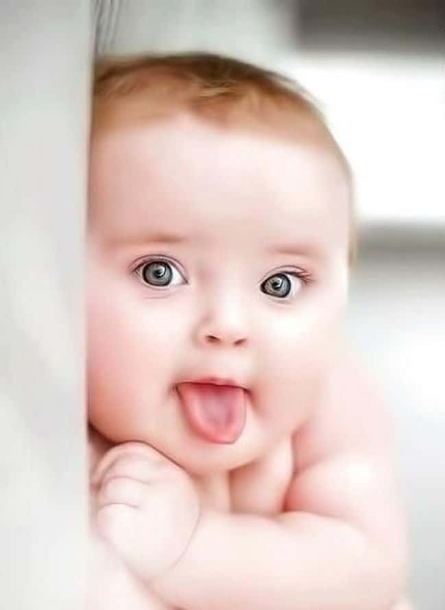 Baby Tongue Out Wallpaper