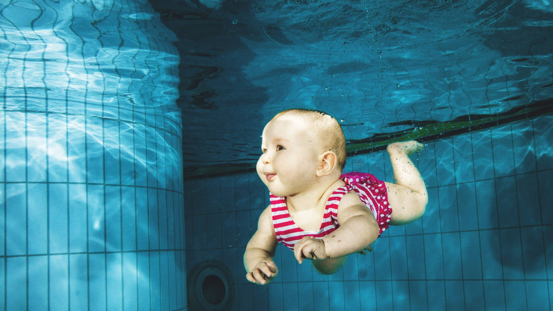 Baby Under Swimming Pool Wallpaper