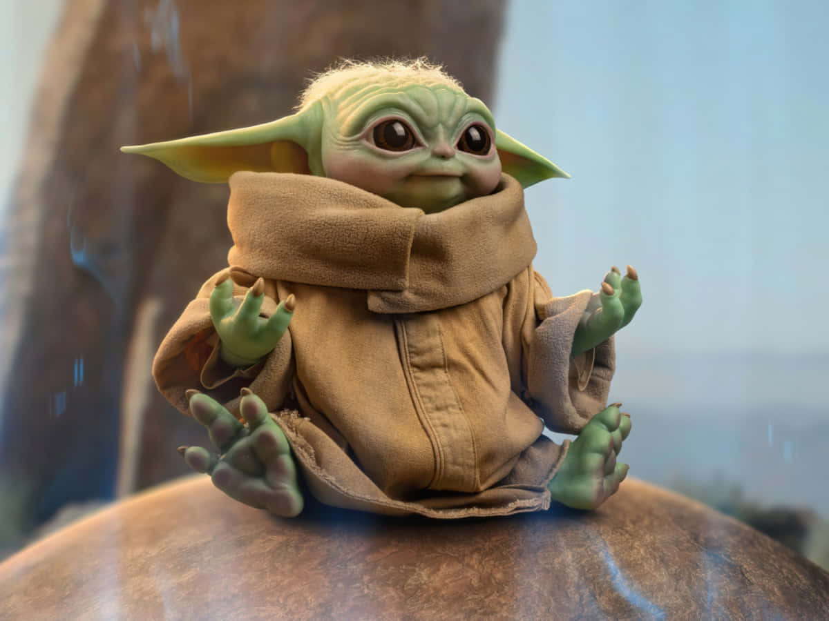 Feel the force of cuteness with this Baby Yoda wallpaper.