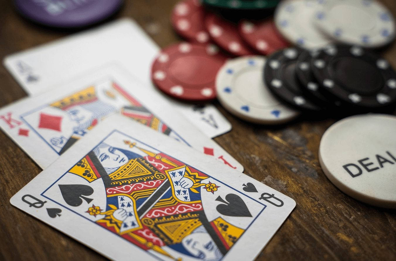 Baccarat Game Card Wooden Table And Chips Wallpaper