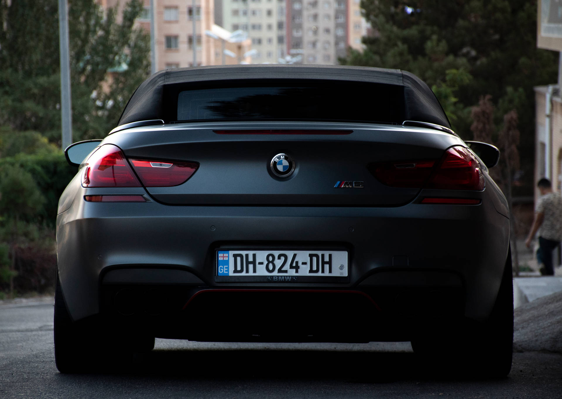 Back of A Parked Black BMW M Wallpaper