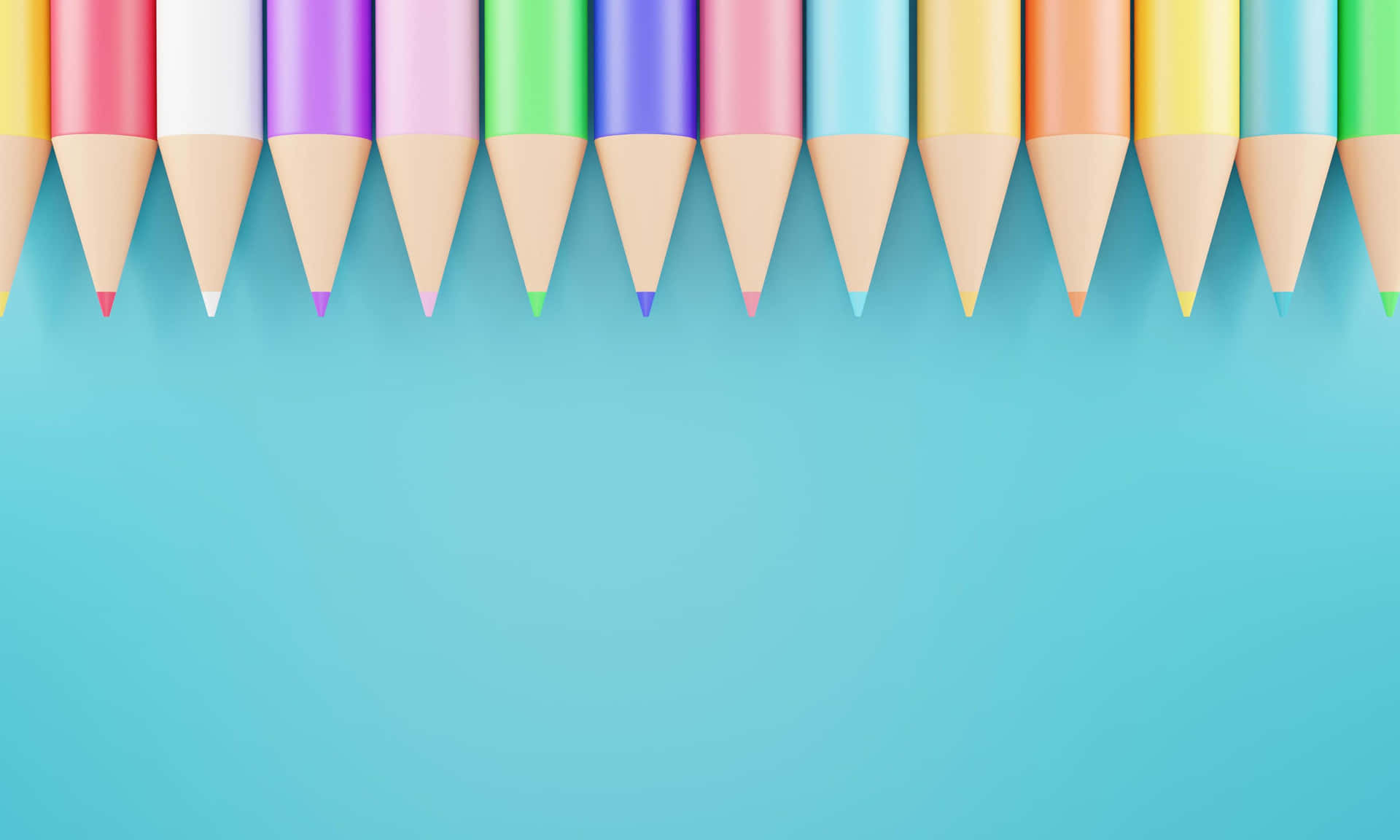 Colorful Pencils In A Row On A Blue Background