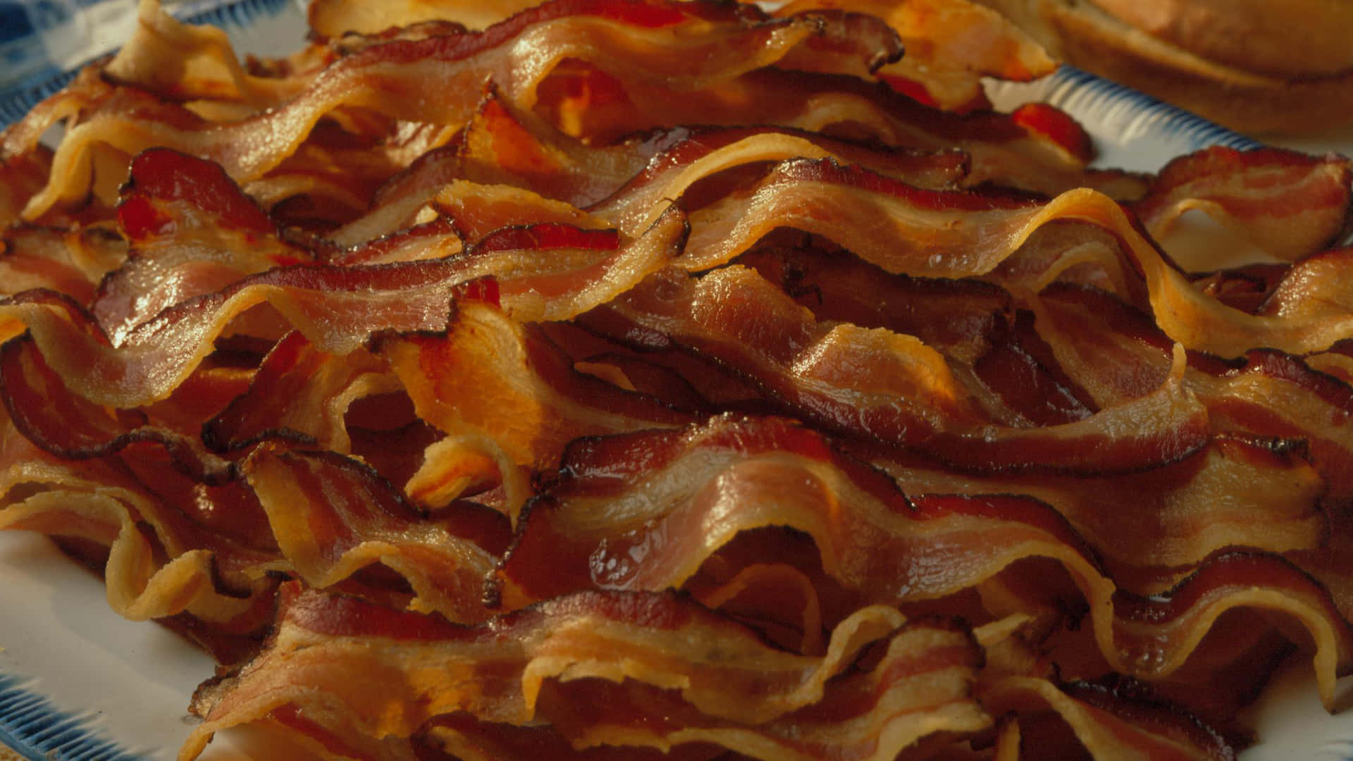 Start your day right with a delicious strip of bacon.