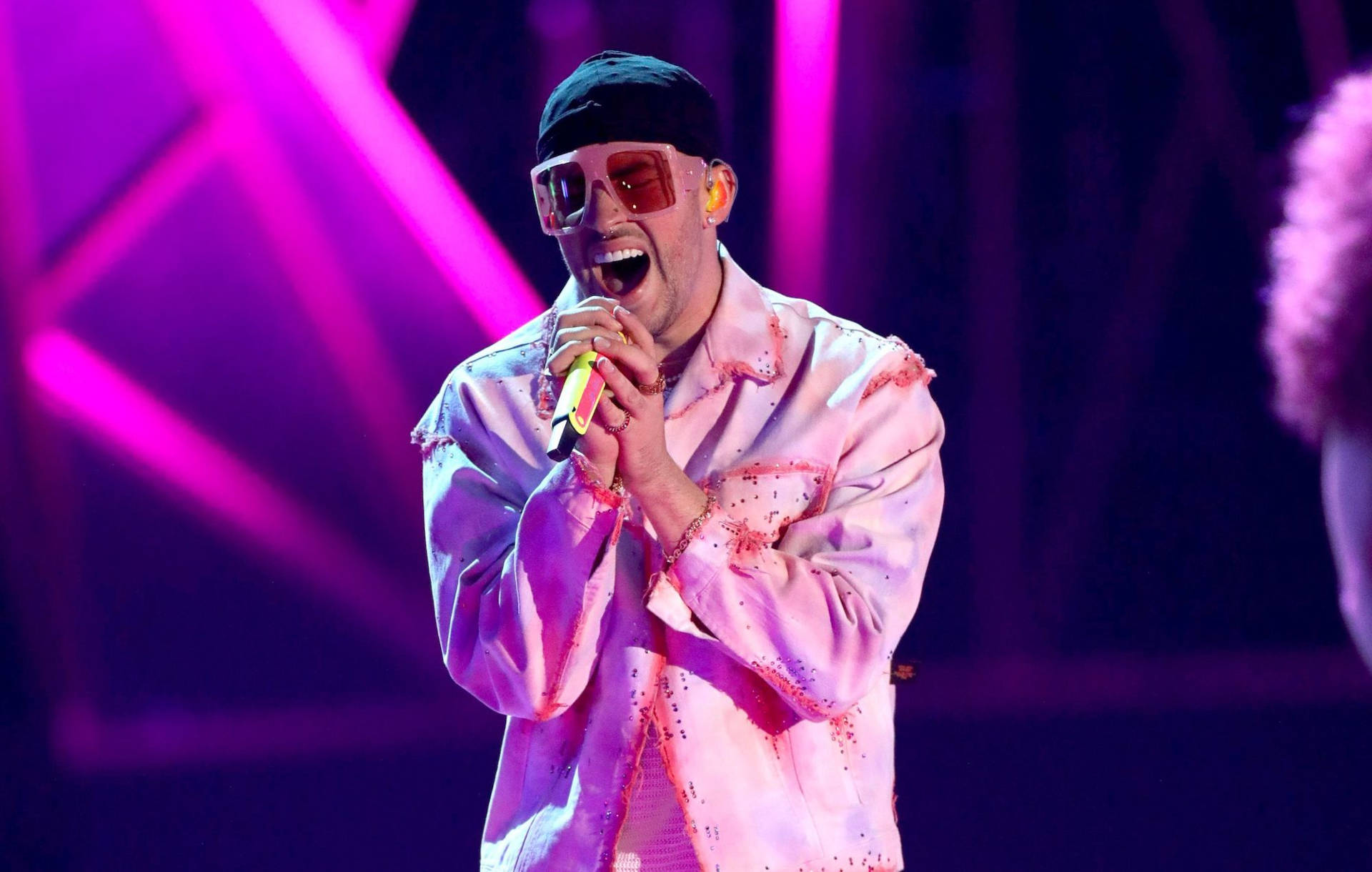 Bad Bunny Performing On Stage Wallpaper