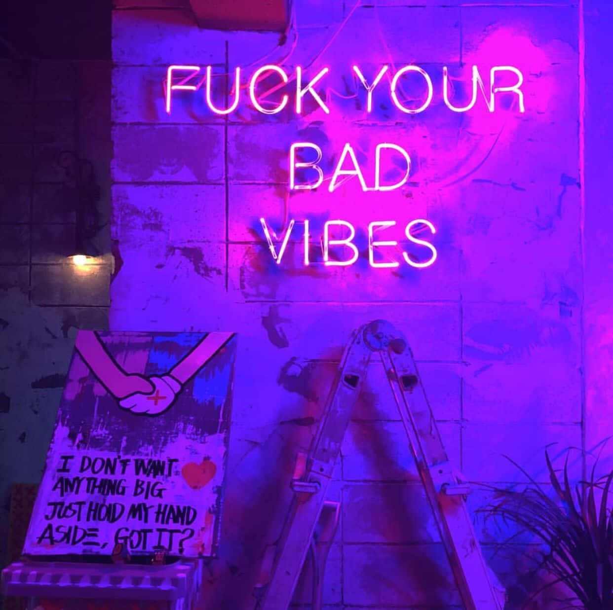 "Bad vibes don't stand a chance against positivity." Wallpaper