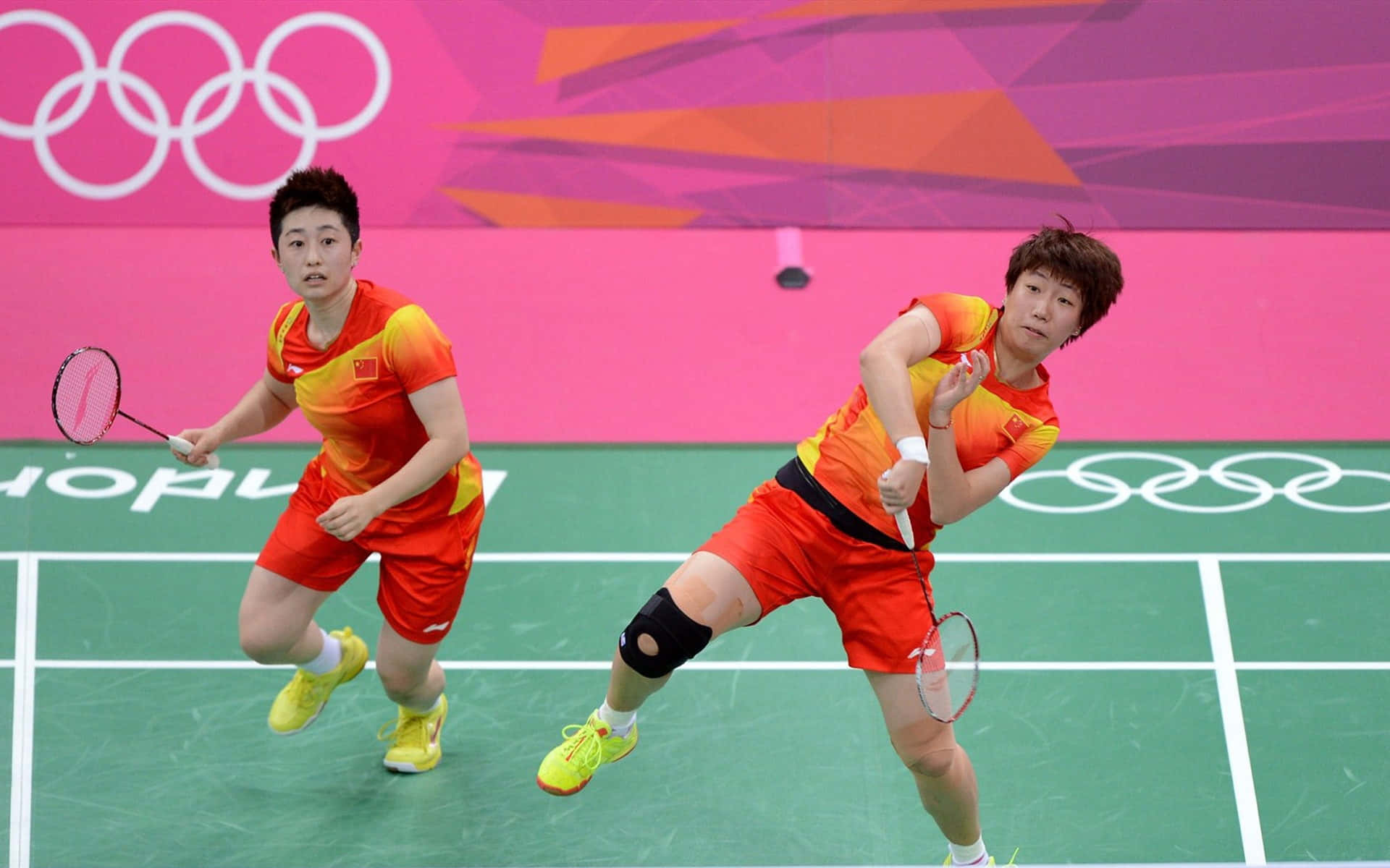 Professional Badminton Players Competing Intensely