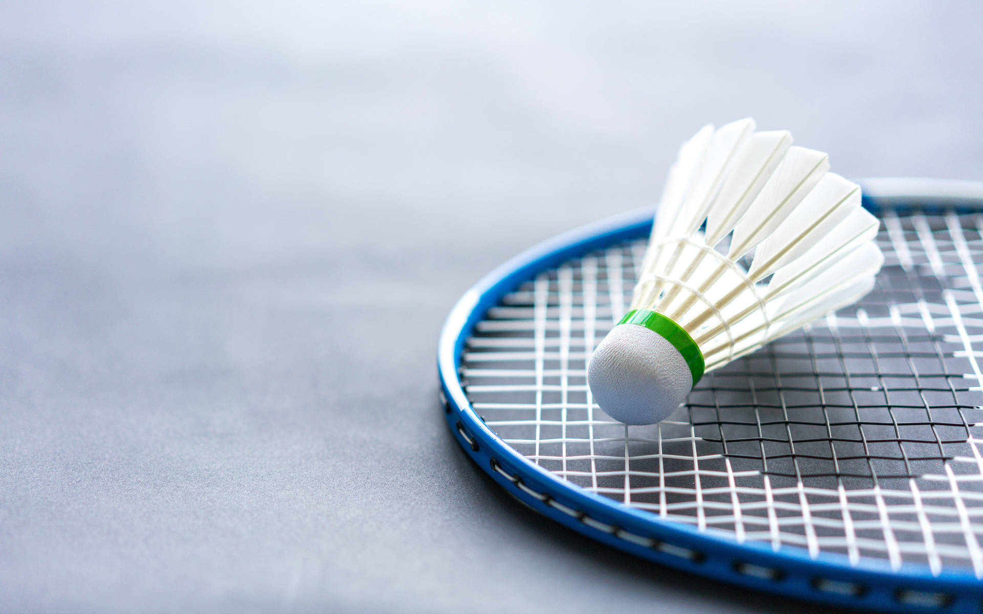 Badminton Racket And Shuttlecock Wallpaper