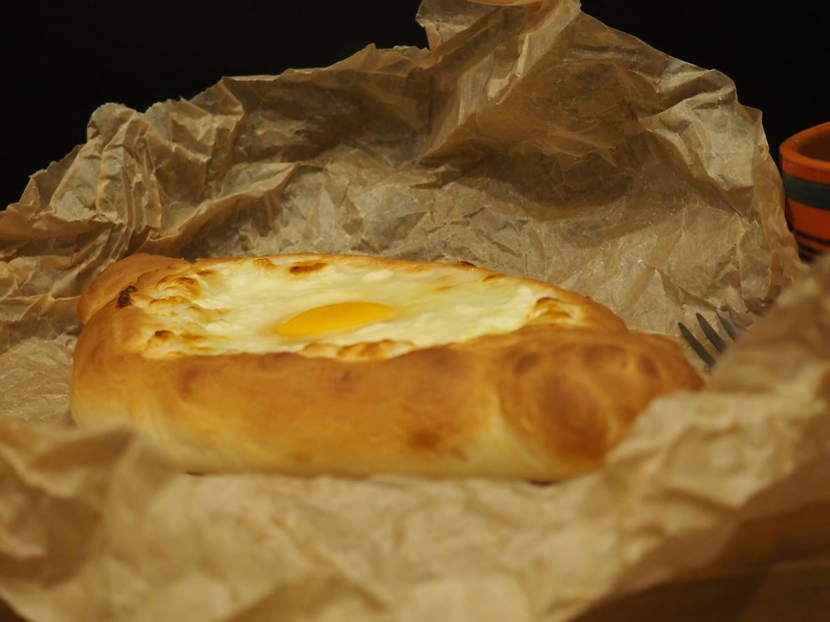 Baked Khachapuri On Brown Wrapping Paper Wallpaper