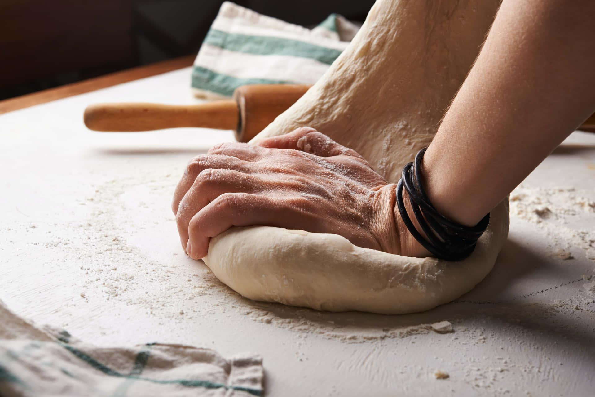 A Person Is Making A Dough