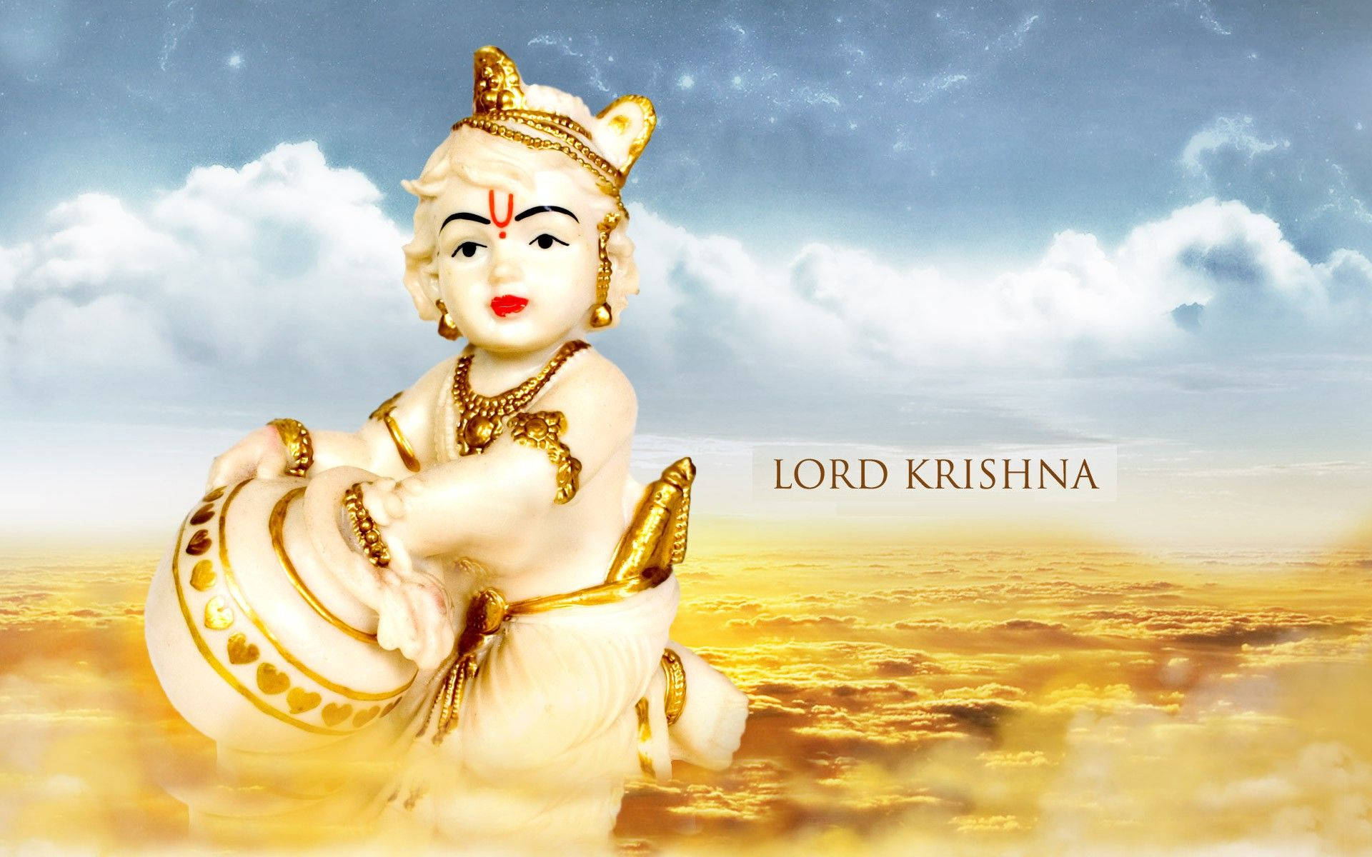 Download Bal Krishna Figurine Over Gold Clouds Wallpaper 