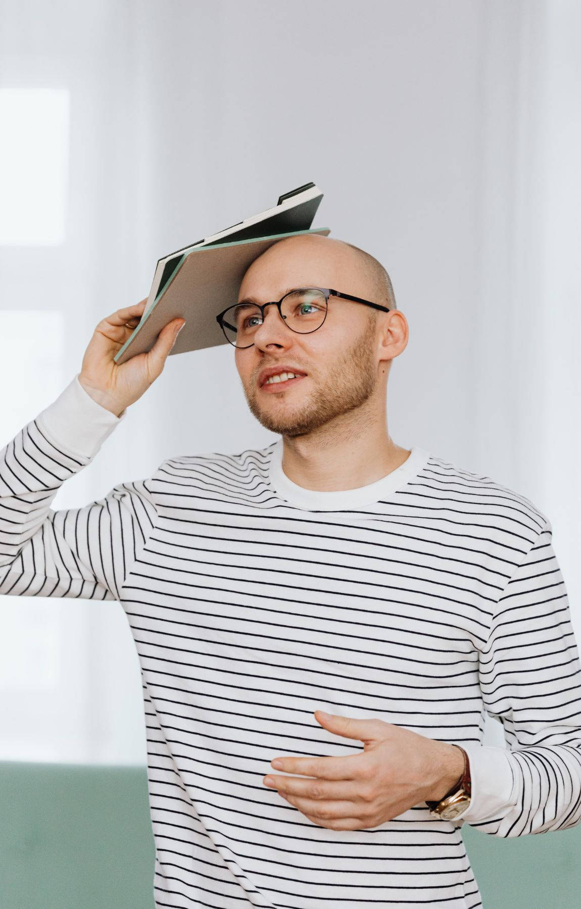 Bald Man With Books Picture
