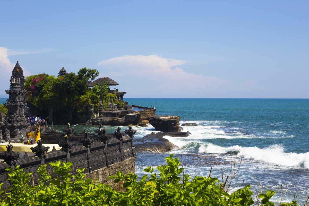 Caption: A breathtaking view of Bali Island's beach with crystal-clear water and white sand Wallpaper