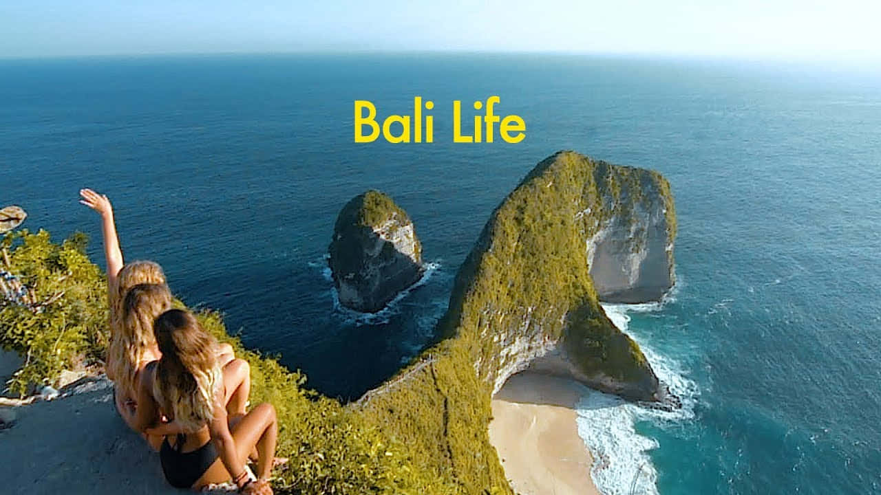 Adembenemende Zonsondergang Boven Kelingking Strand, Bali Achtergrond