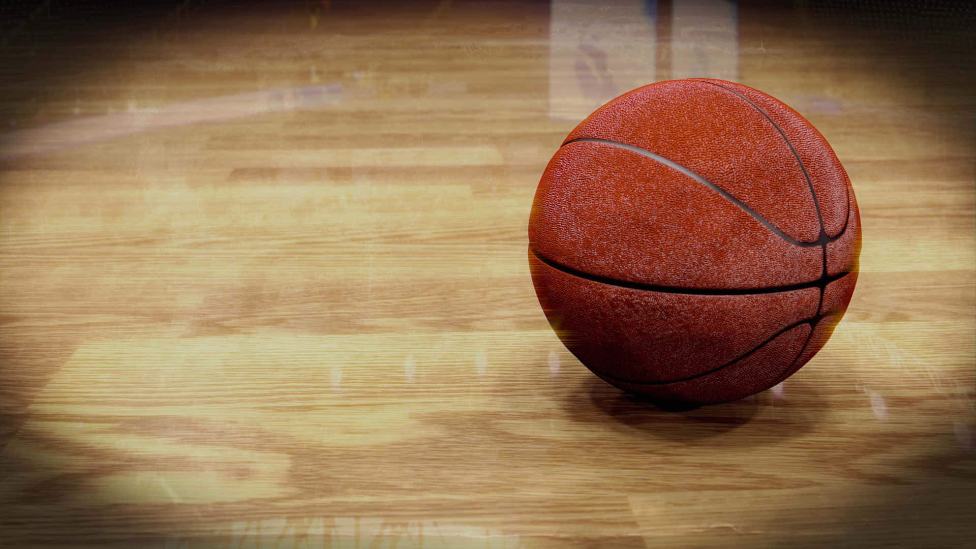 A Basketball Ball On A Wooden Floor