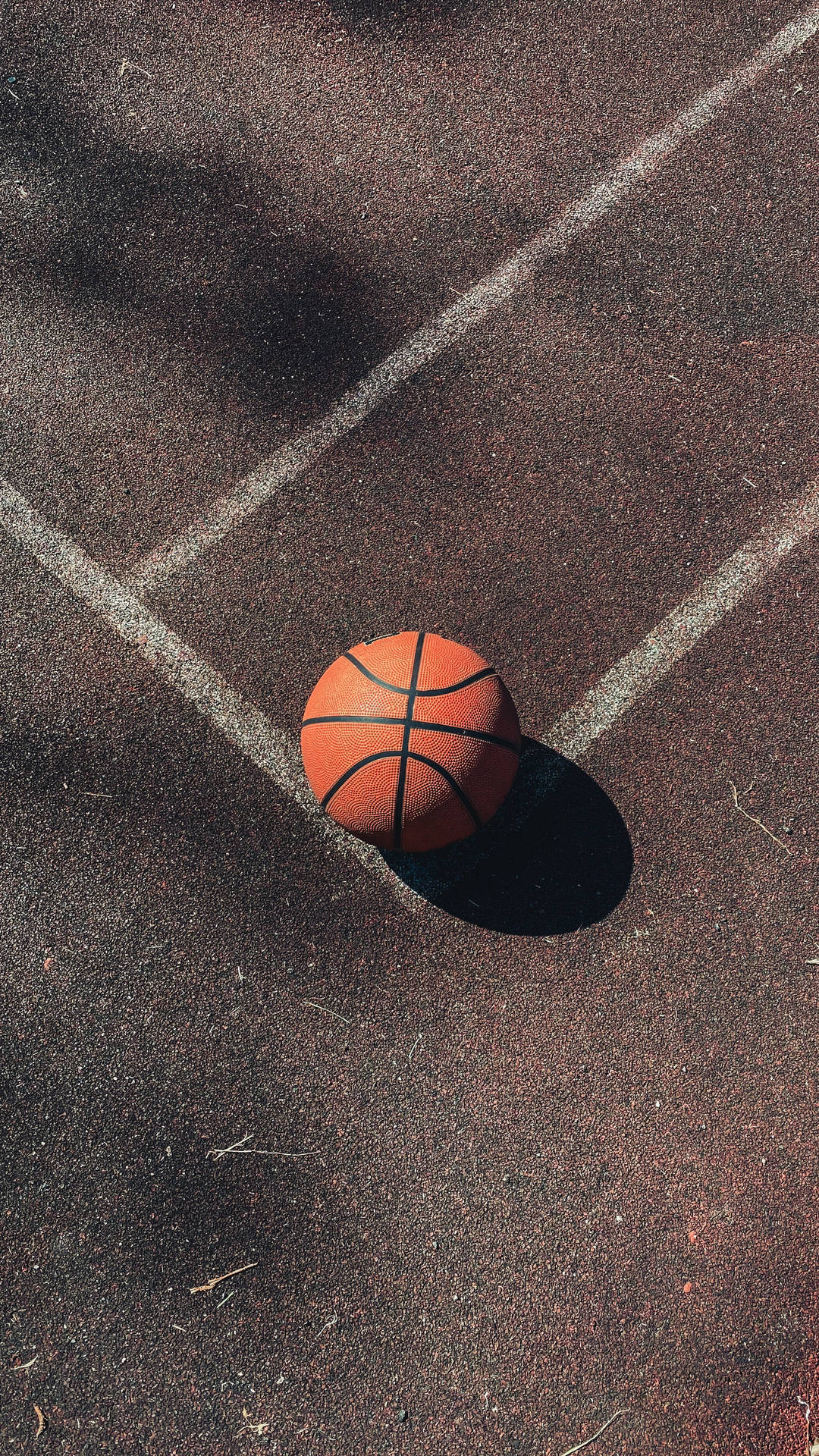 Ball on Concrete Basketball Court Wallpaper