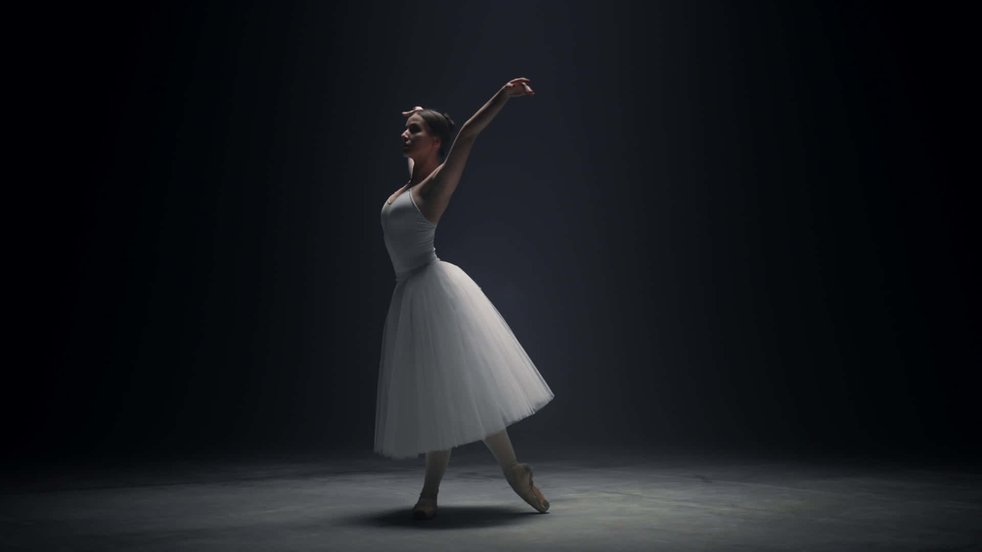A Ballerina Is Dancing In The Dark