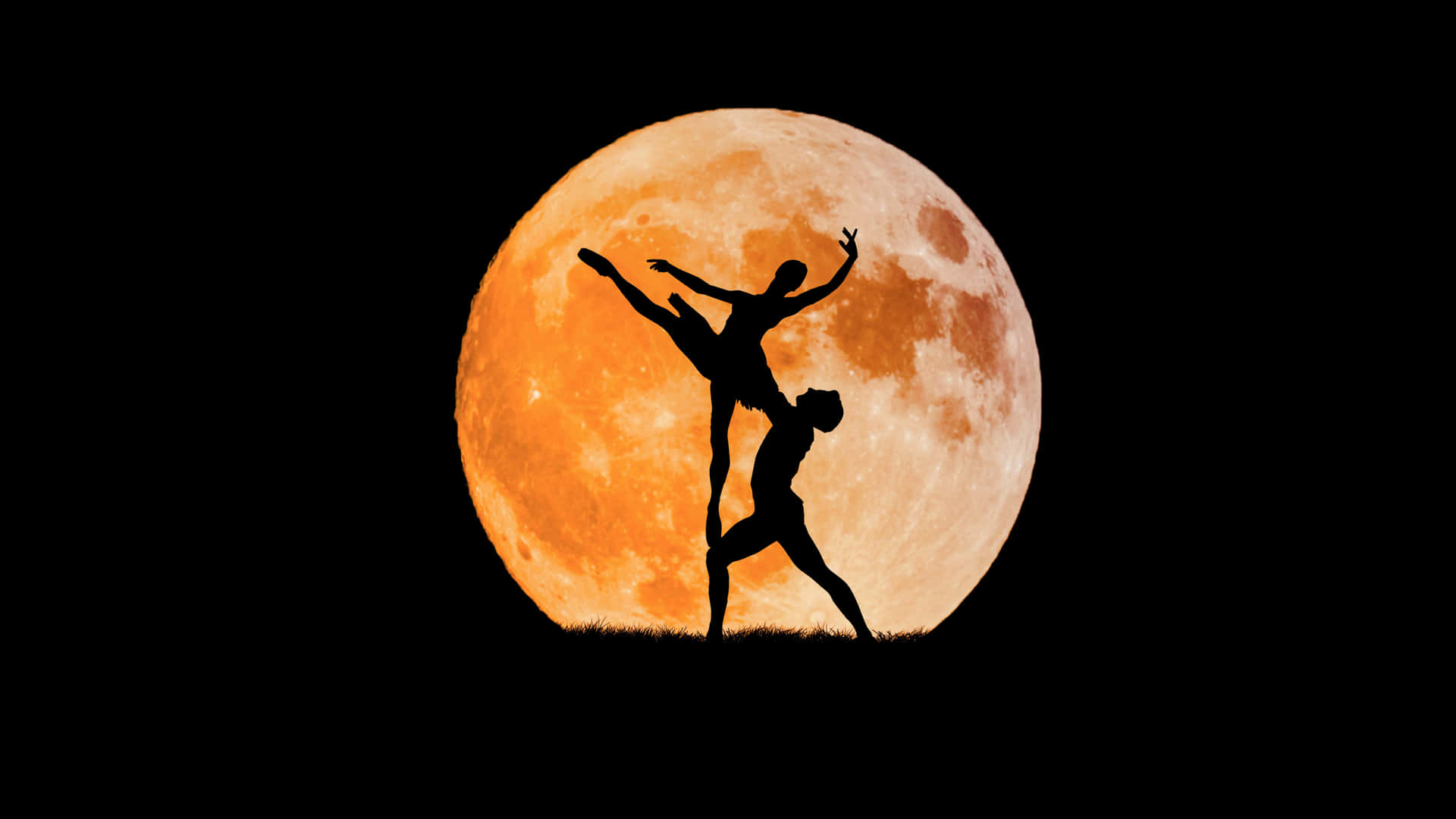 A Couple Of Dancers In Silhouette Against The Moon