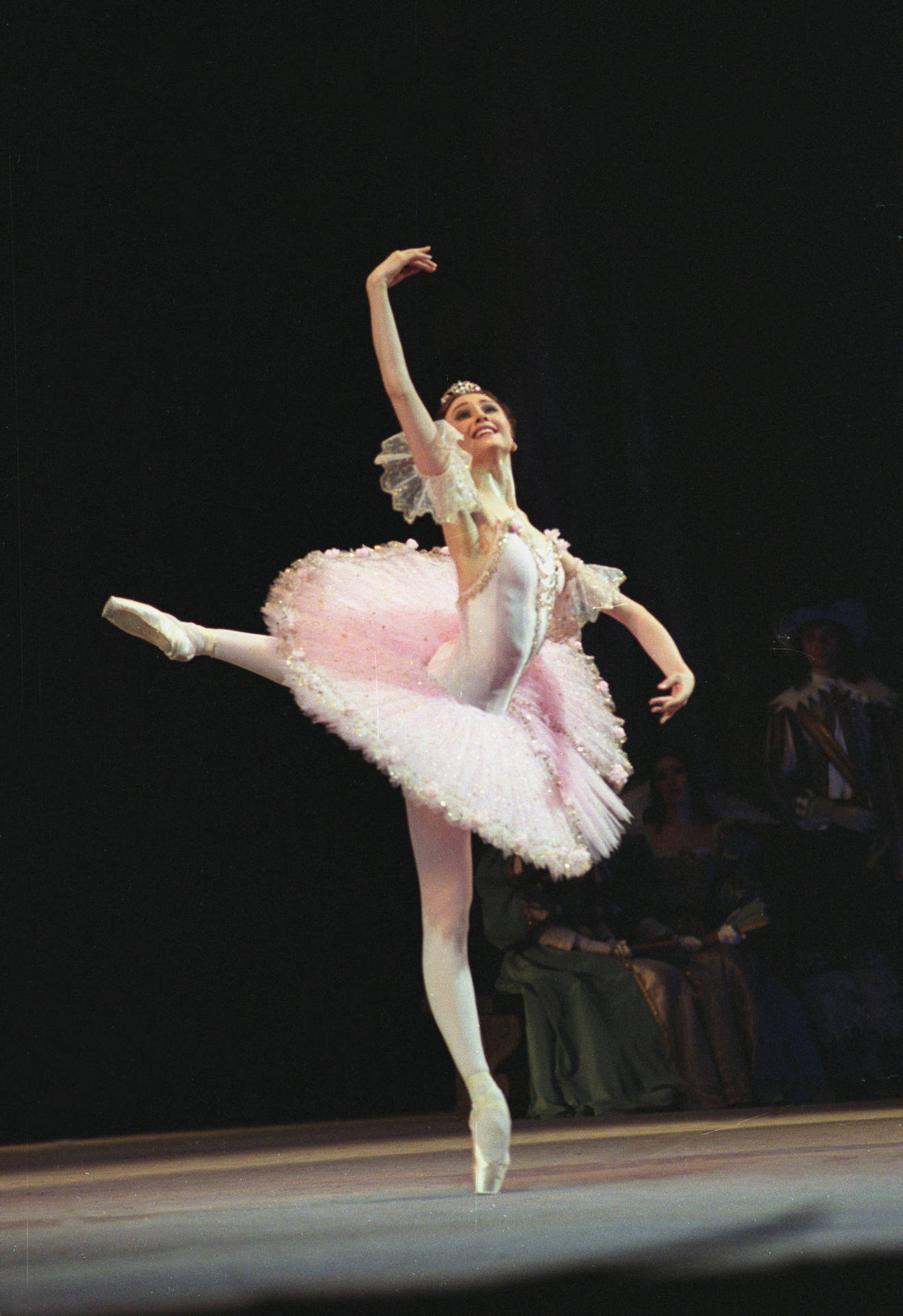 Ballet Dancer Performing On Stage Wallpaper