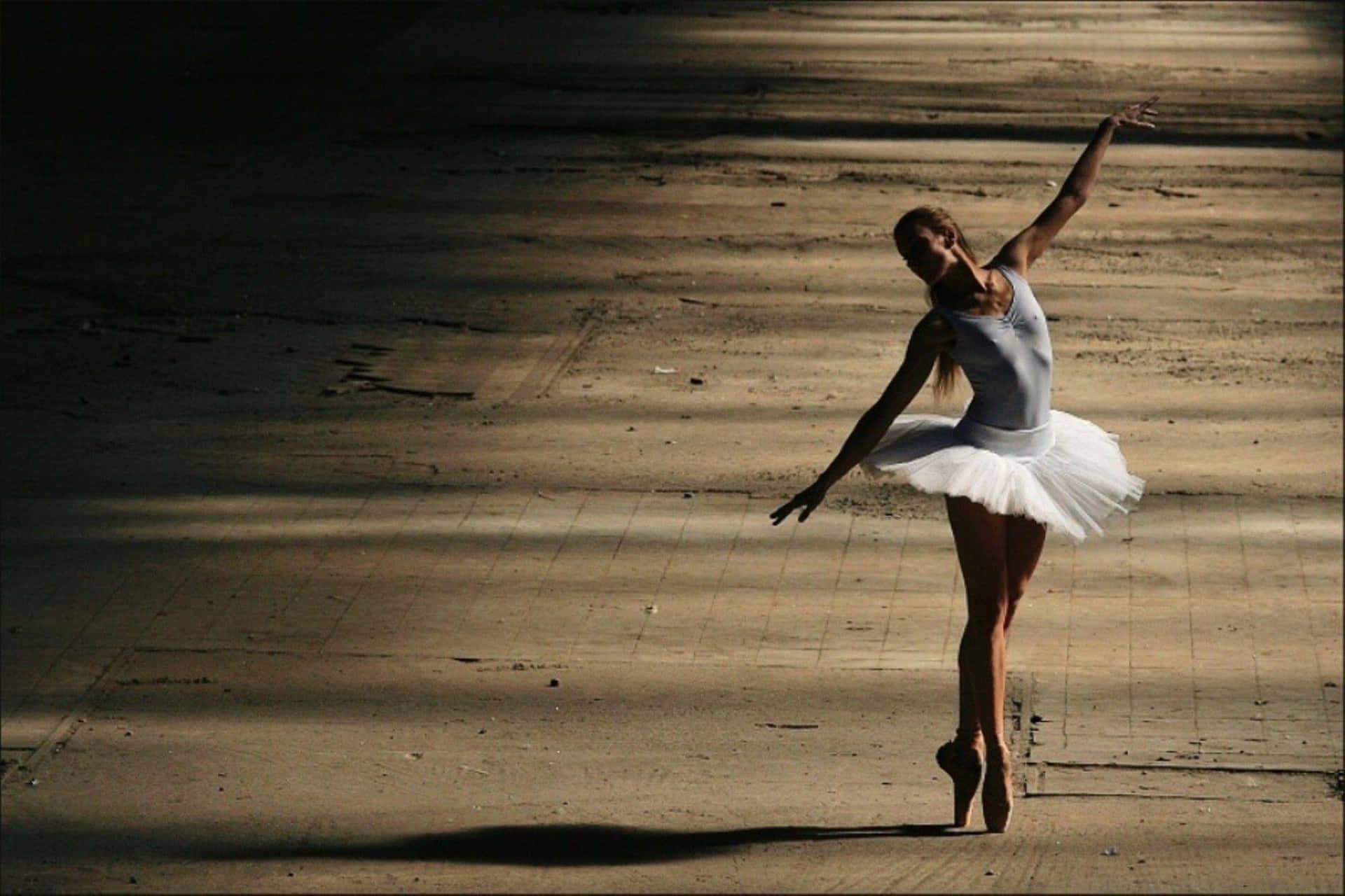 A Ballerina Is Dancing On A Street