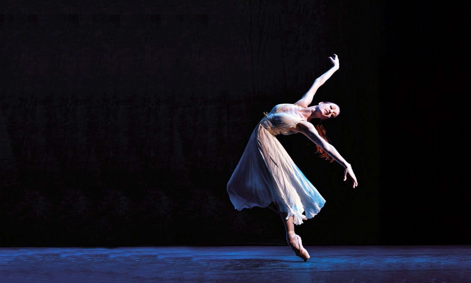 Female Ballet Dancer Gracefully Executing a Pas De Cheval