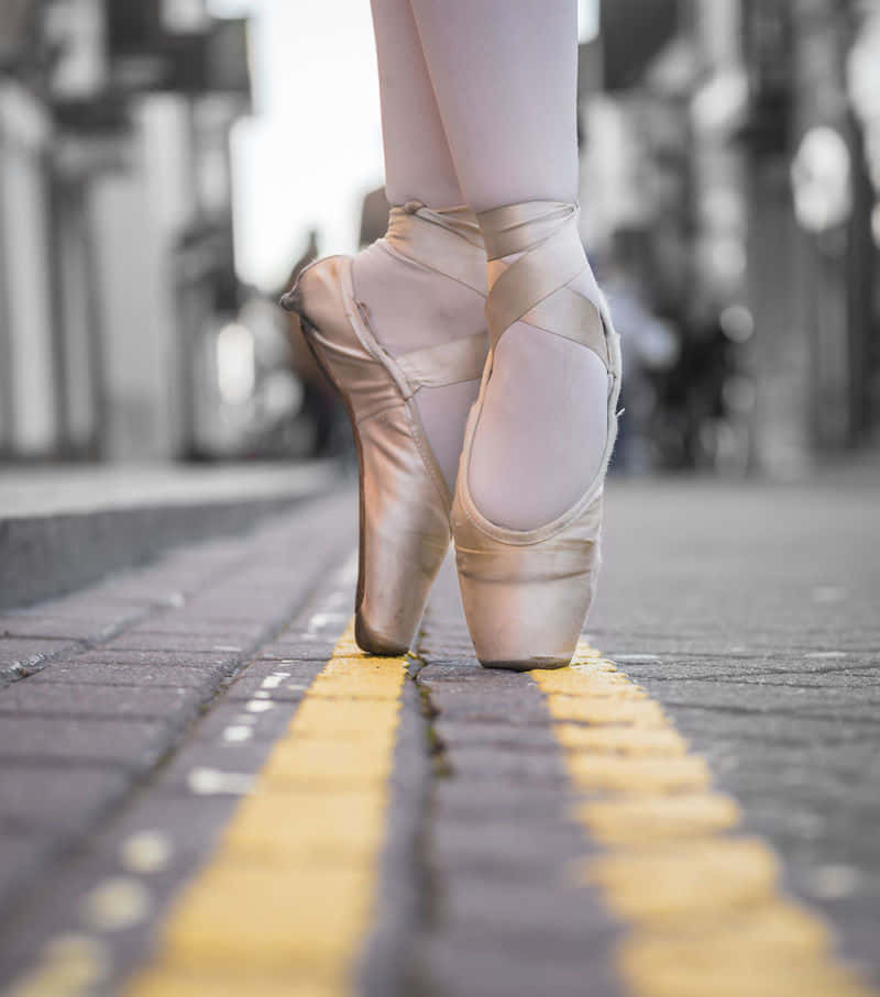 An artist to her craft: The delicate beauty of a pair of pointe shoes Wallpaper