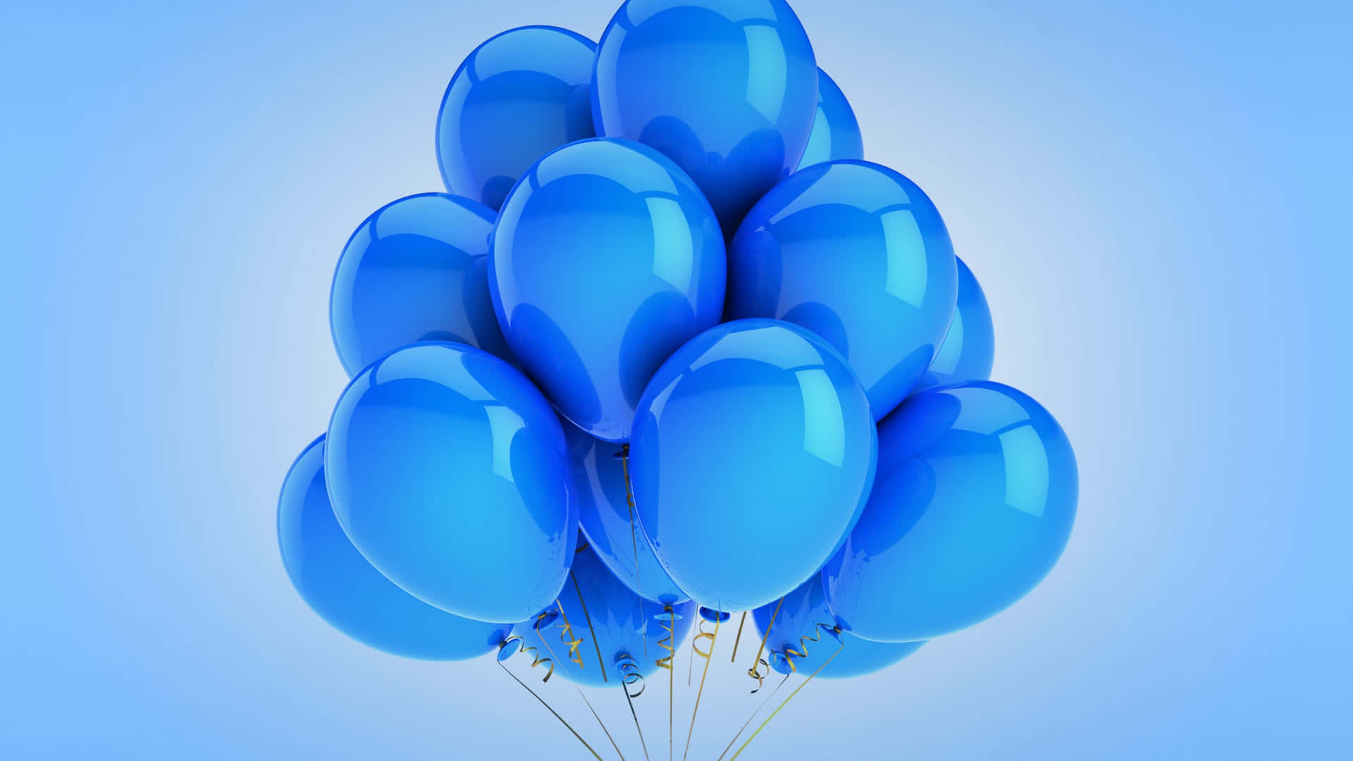 Colorful balloons fly against a crisp blue sky
