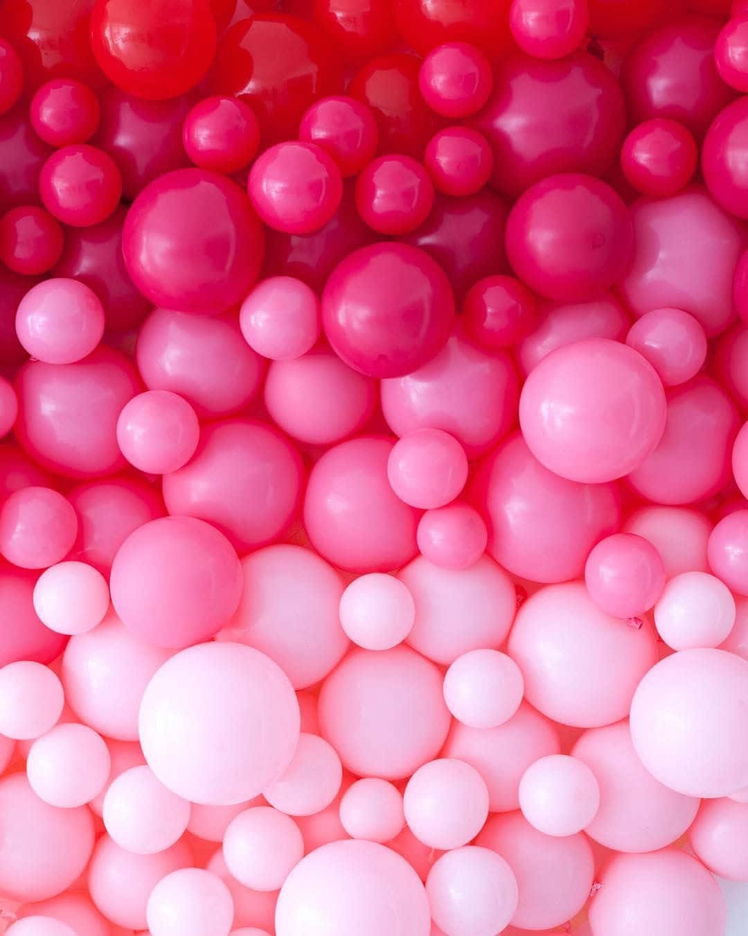 Hintergrundmit Ballons: Rosa Ballons Mit Unterschiedlicher Farbintensität.