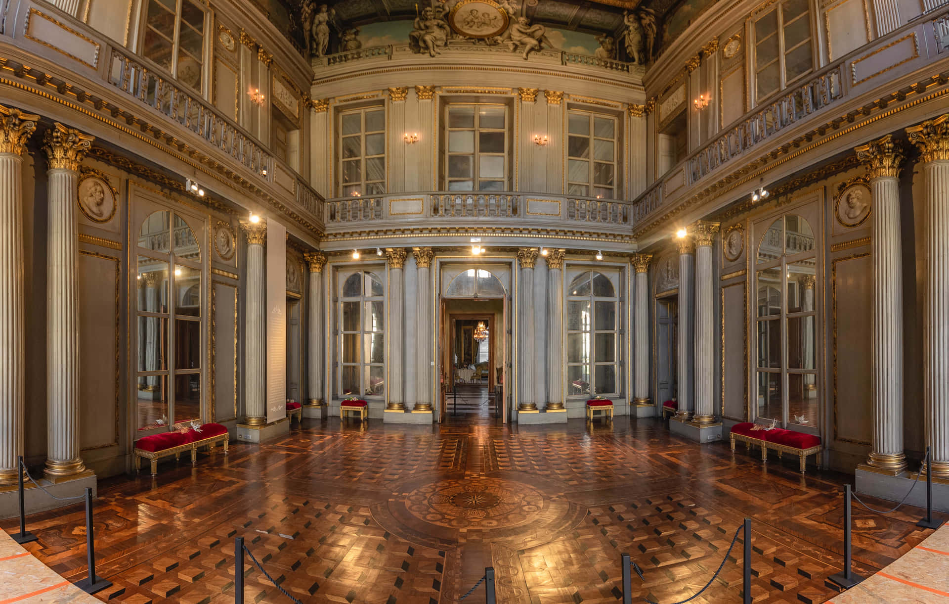 A Circular Room With A Wooden Floor