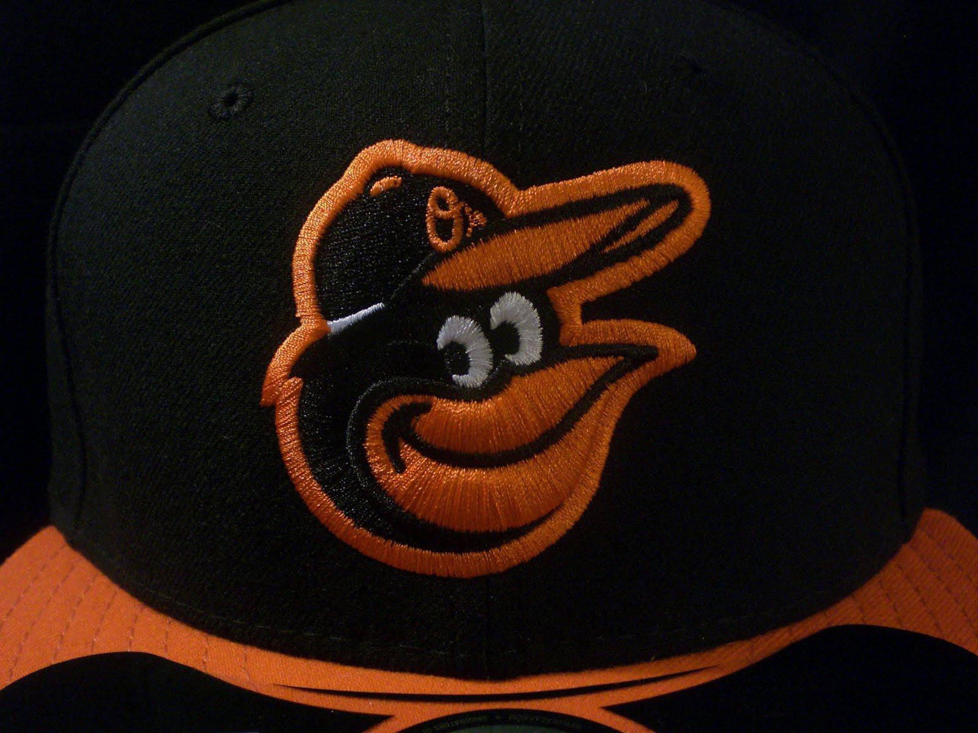 Official Baltimore Orioles Baseball Cap with Emblem Wallpaper