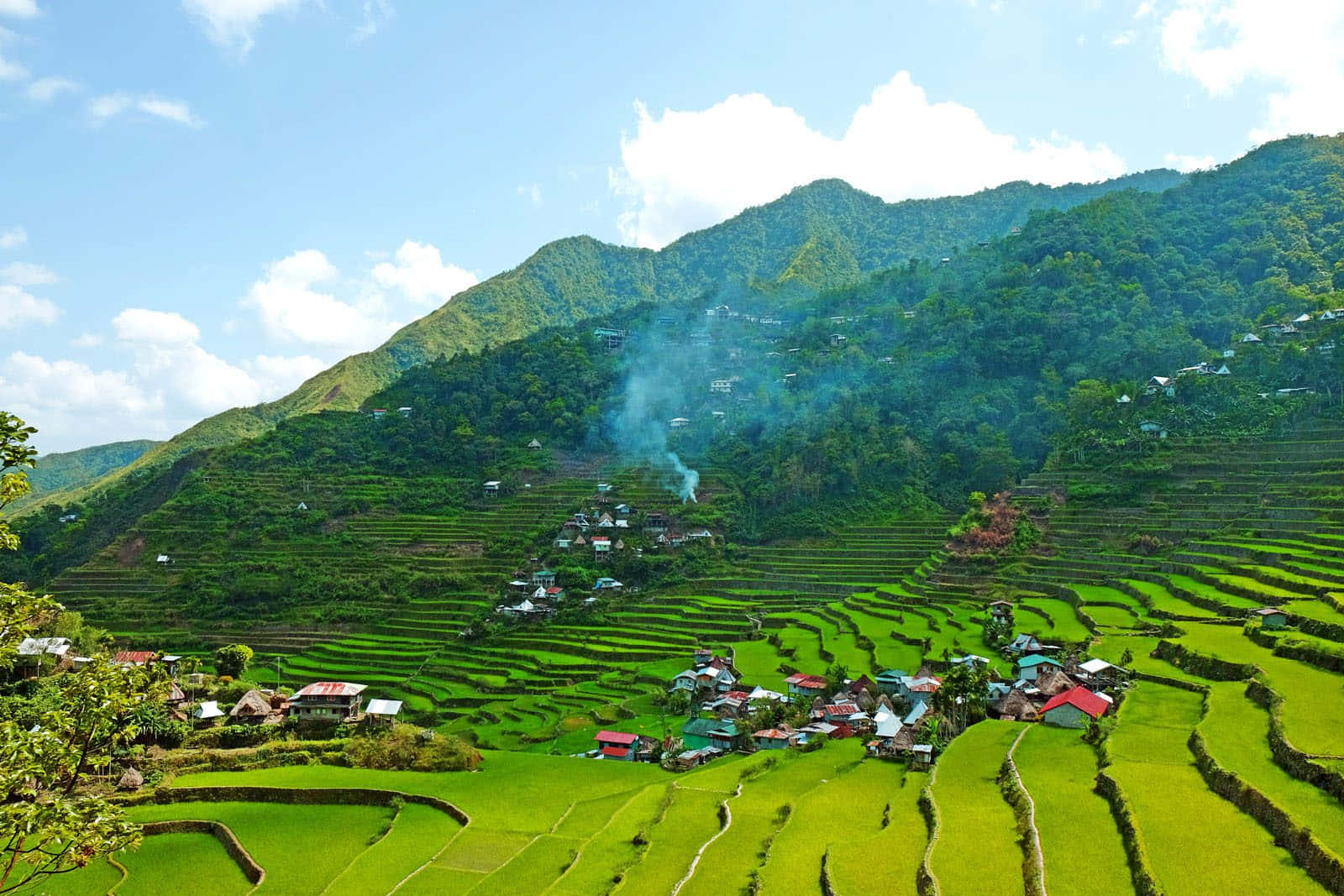 Banaue Rice Terraces In The Philippines With Smoke Wallpaper