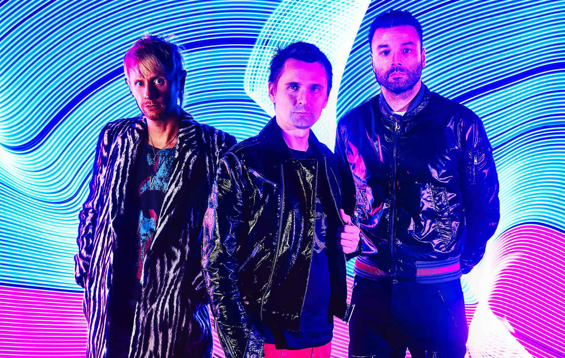 Band Members Against Neon Lights Wallpaper