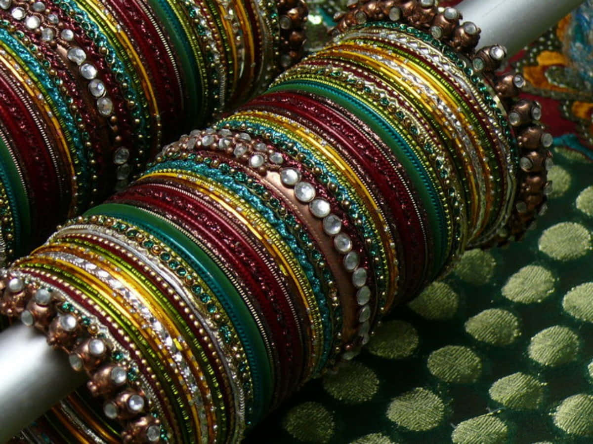 A Group Of Colorful Bangles On A Table