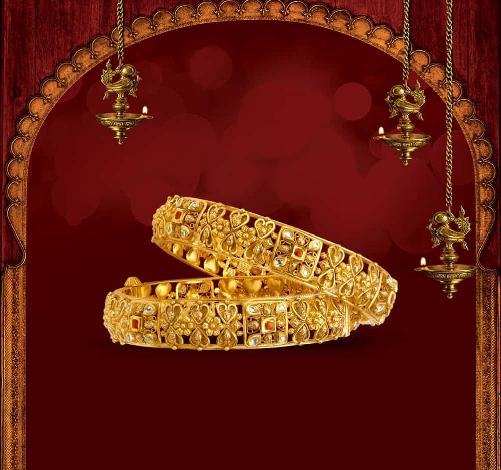 Gold Bangles With A Red Background