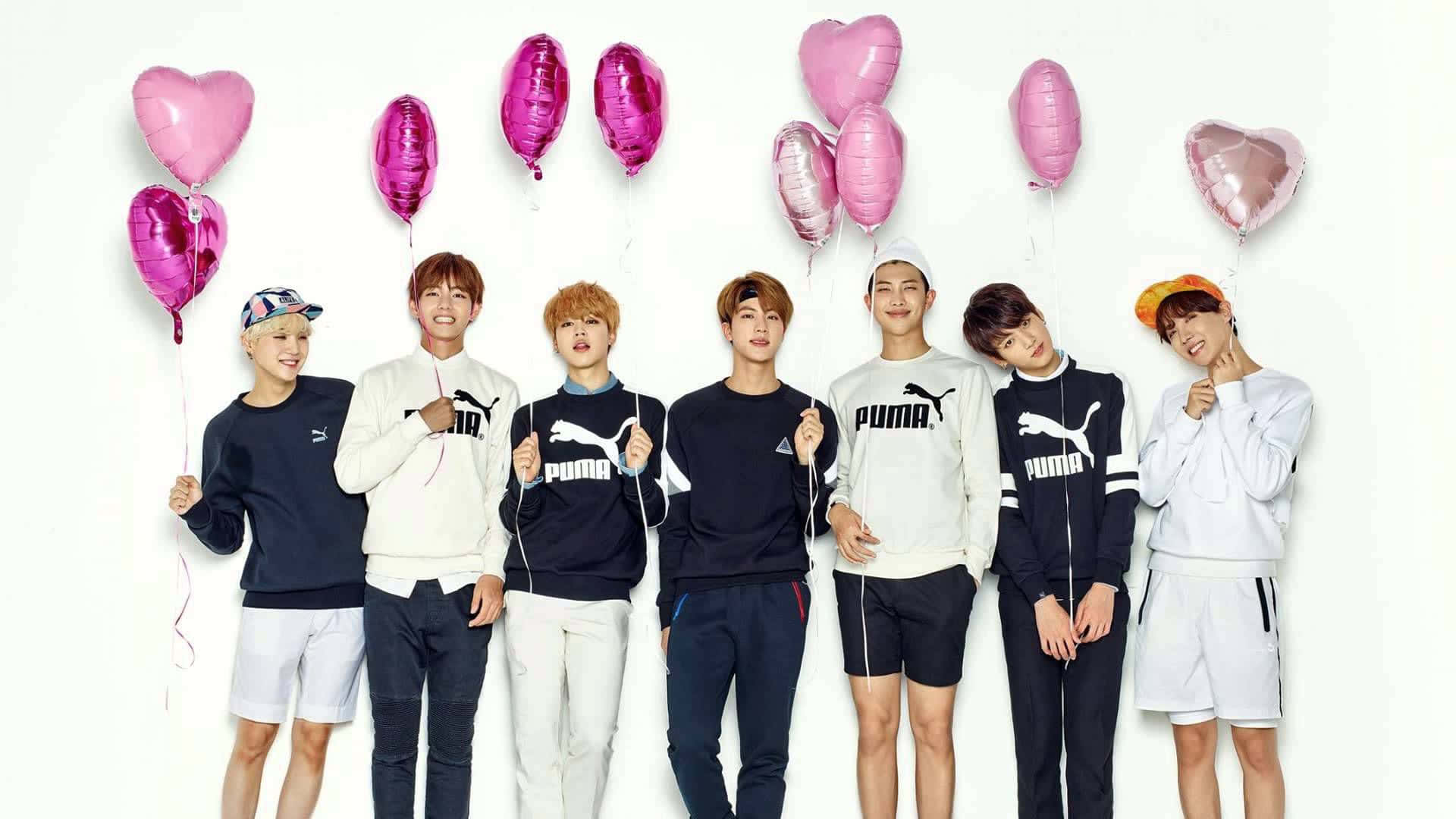 Bangtan Sonyeondan (BTS) Members in a Stunning Group Photo Wallpaper
