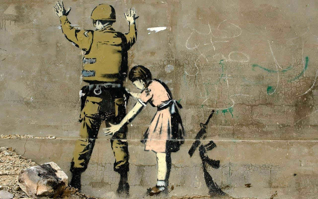 "The Art of Banksy Banks Up the Walls of the City"