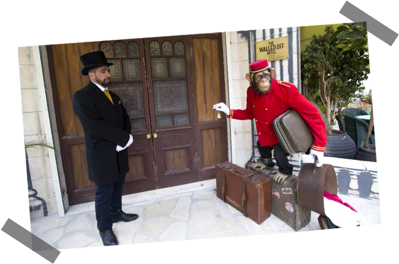 Banksy Walled Off Hotel Bellhop Monkey PNG