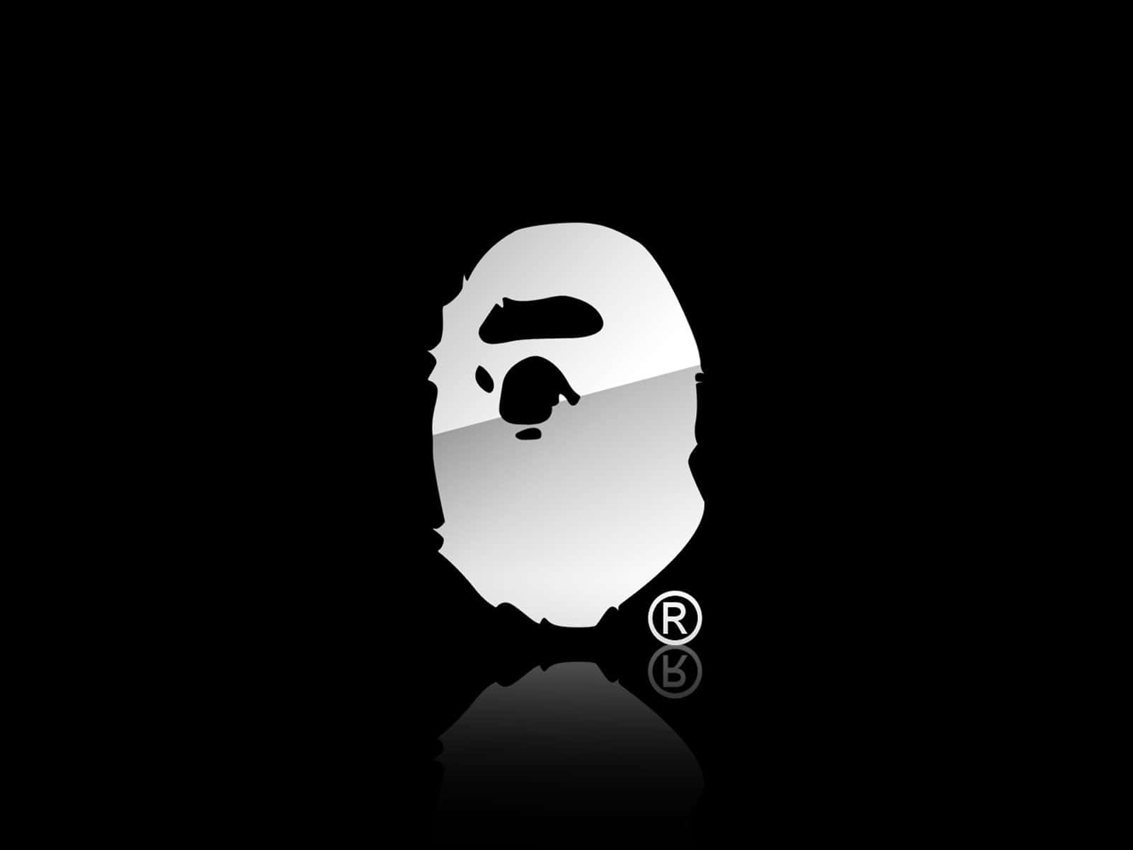 a bathing ape logo on a black background