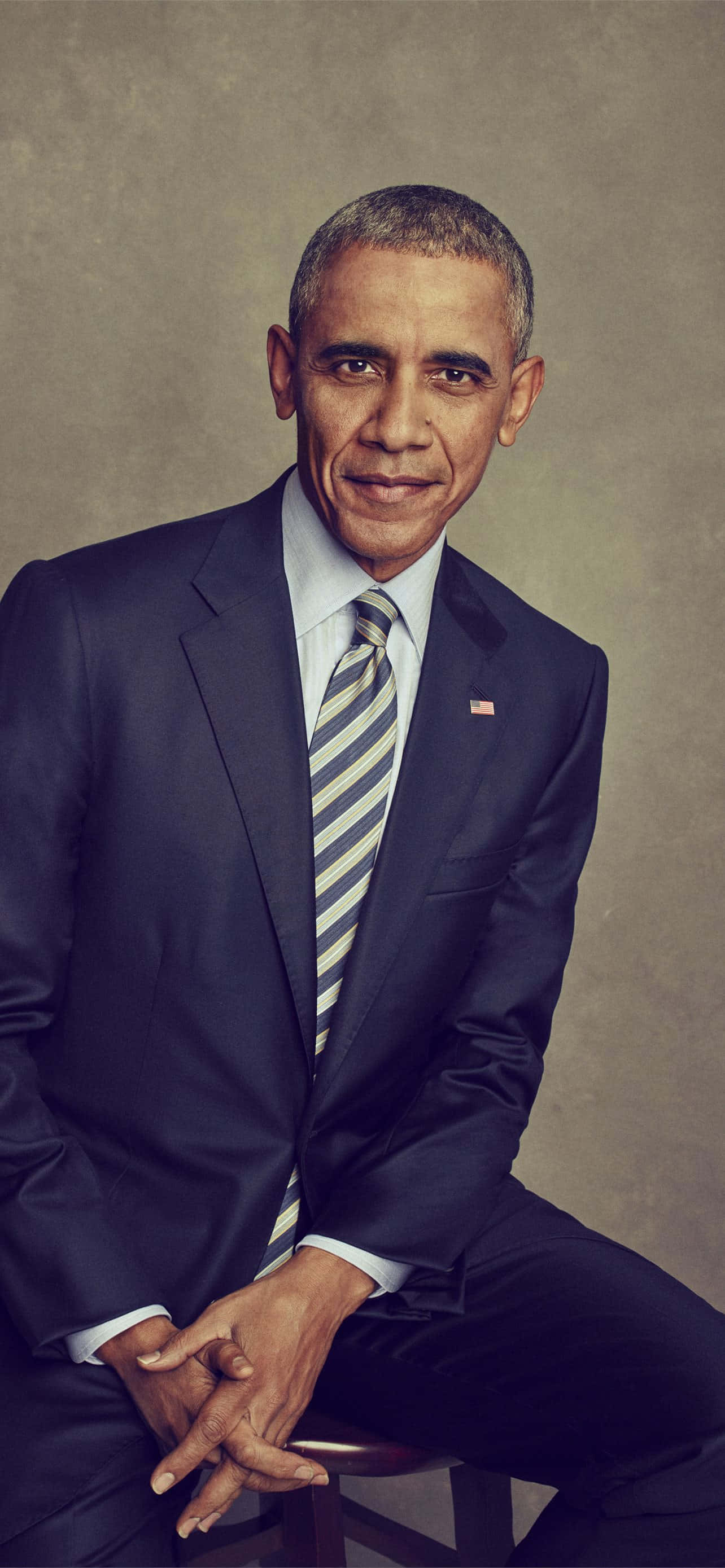 Derehemalige Präsident Barack Obama Lächelt Während Einer Veranstaltung.