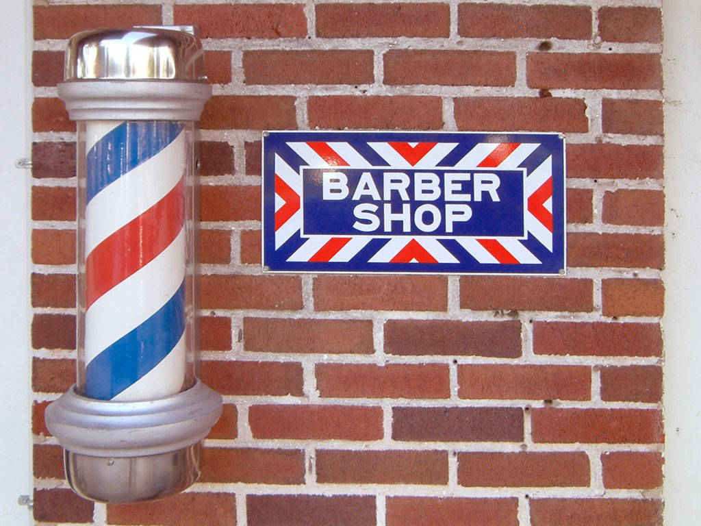 Barber Pole On Brick Wall Wallpaper