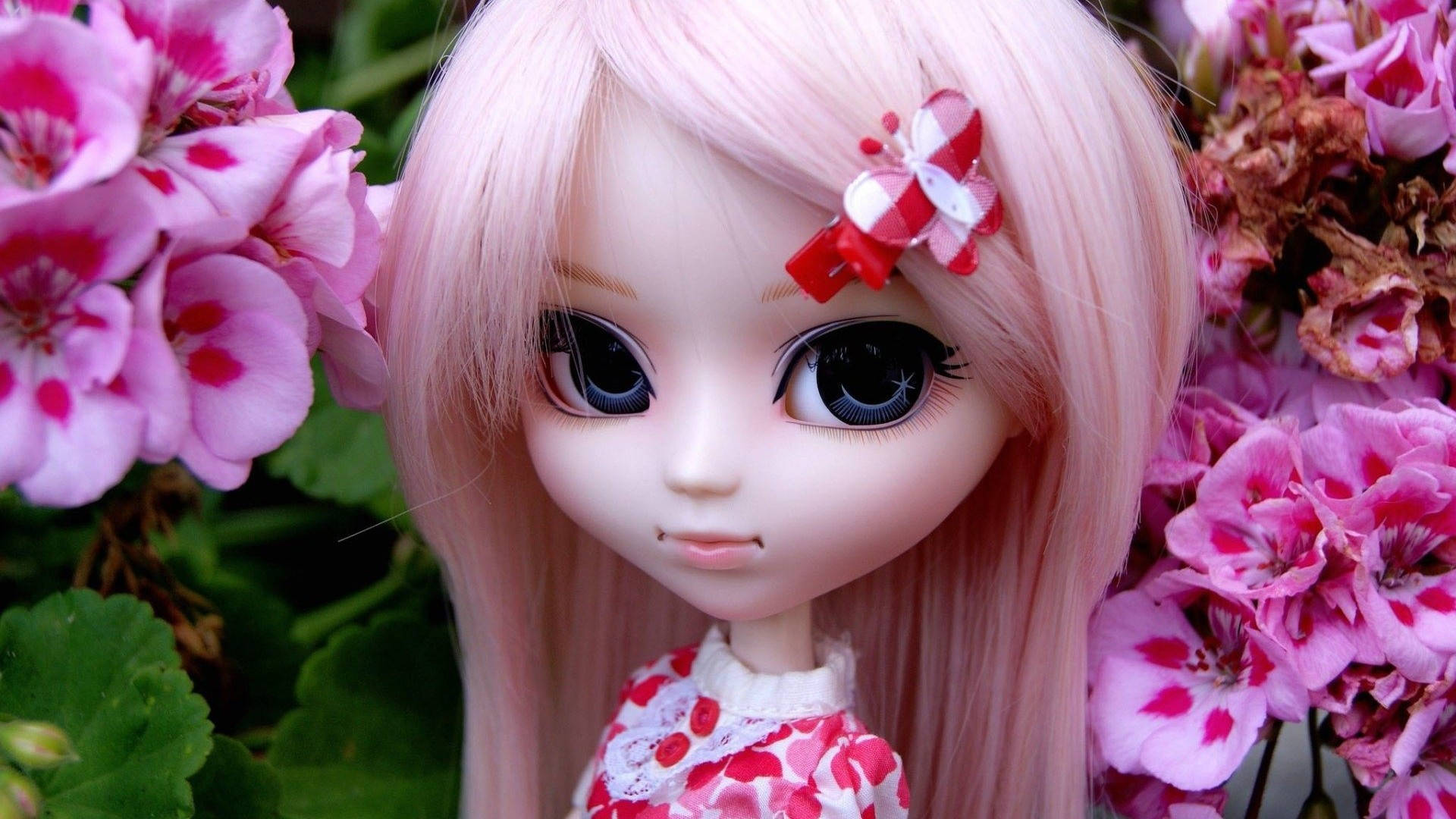 Barbie Doll With Pink Flowers Wallpaper