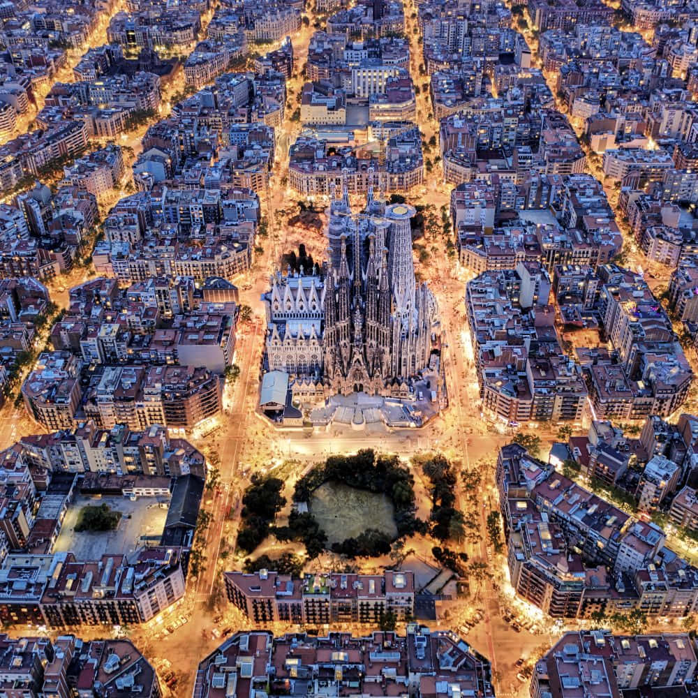 Download Aerial View Of Barcelona At Night | Wallpapers.com